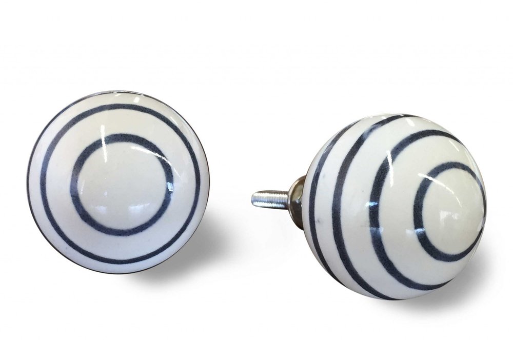 Set of Twelve White and Black Ceramic Drawer Pull Knobs on a white background
