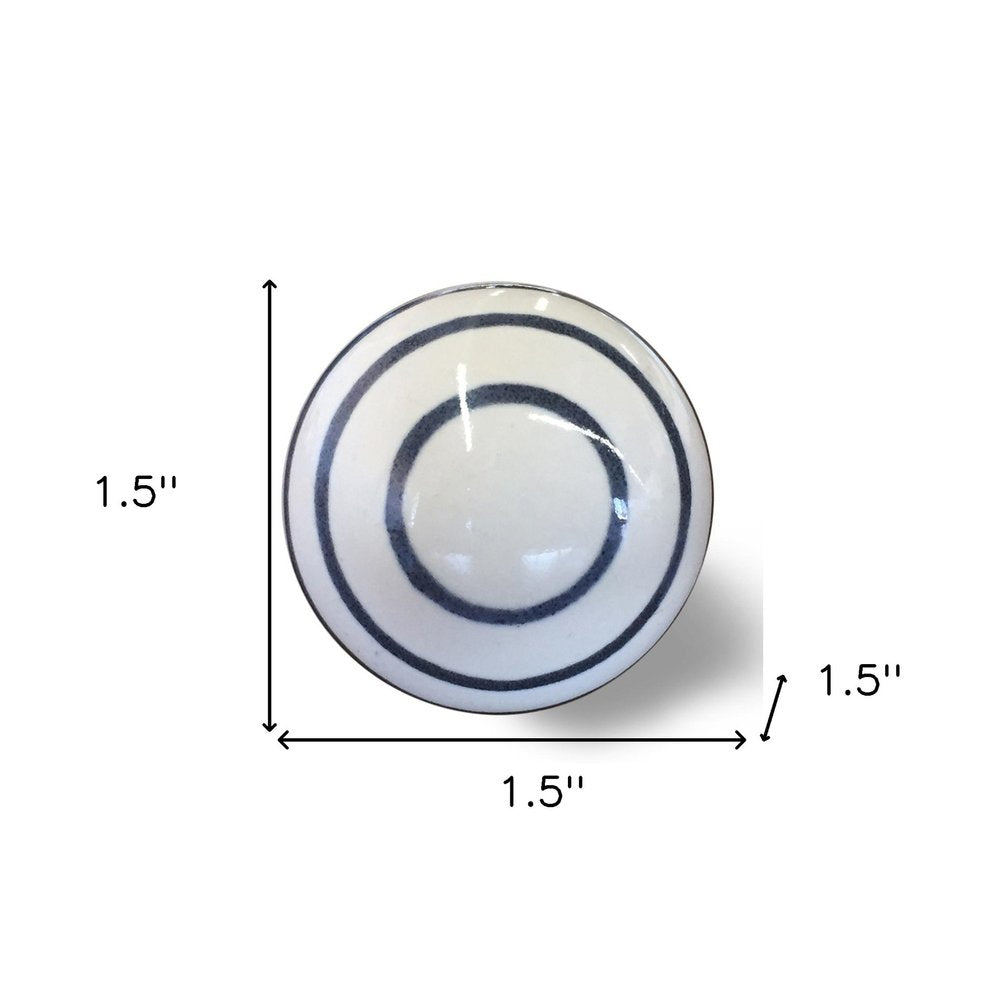 Set of Twelve White and Black Ceramic Drawer Pull Knobs on a white background