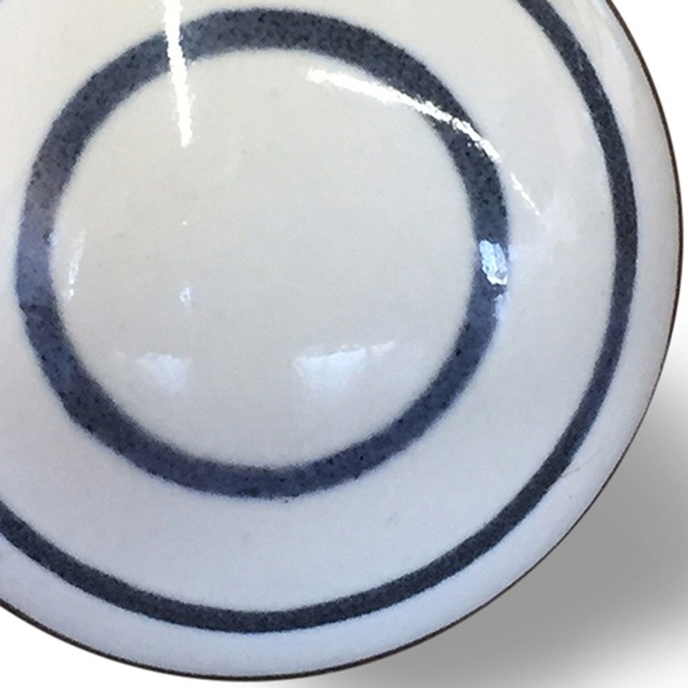 Set of Twelve White and Black Ceramic Drawer Pull Knobs on a white background