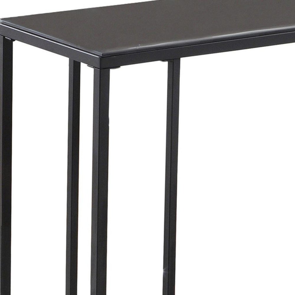 18.25" X 10.25" X 24" Black Metal Tempered Glass Accent Table. Tray table isolated on a plain white background, finished in black glass.