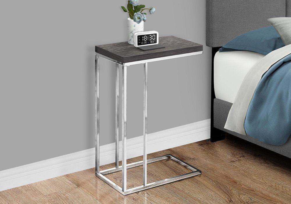 18.25" X 10.25" X 25.25" Grey Particle Board Metal Accent Table styled in a furnished interior with a light gray wall on a wood floor in gray metal.