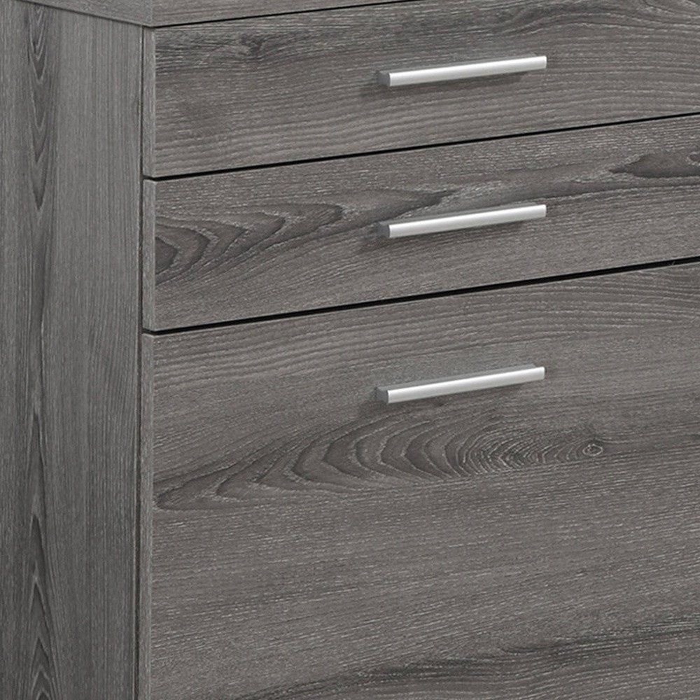 Close-up of 25" Gray Particle Board Filing Cabinet With Drawers showing the gray texture.