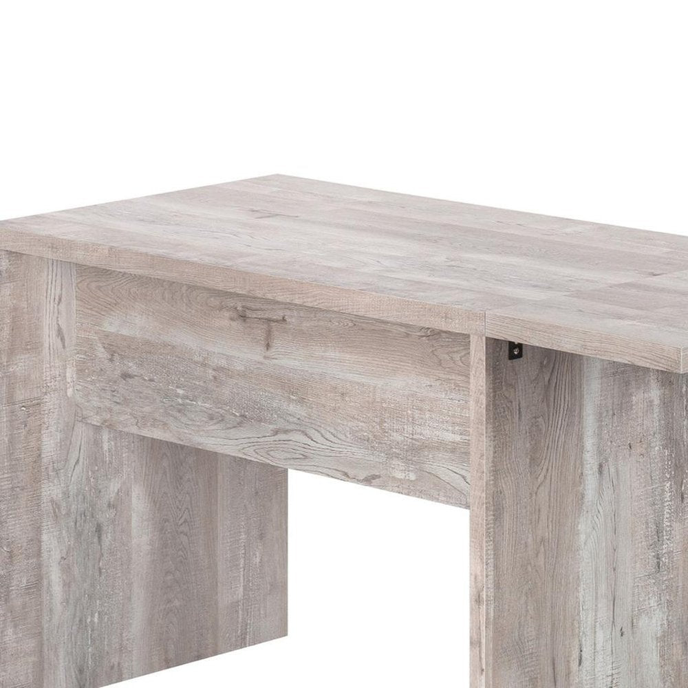 63" Taupe L Shape Computer Desk With Eight Drawers. Desk isolated on a plain white background, finished in taupe.