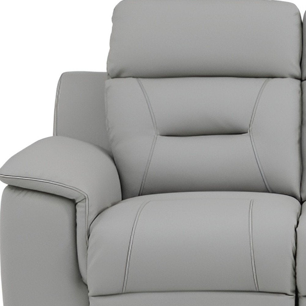 90" Gray Faux Leather Reclining Sofa With Brown Legs close-up detail