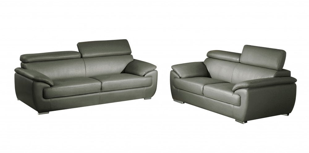Two gray genuine leather sofas on a white background.