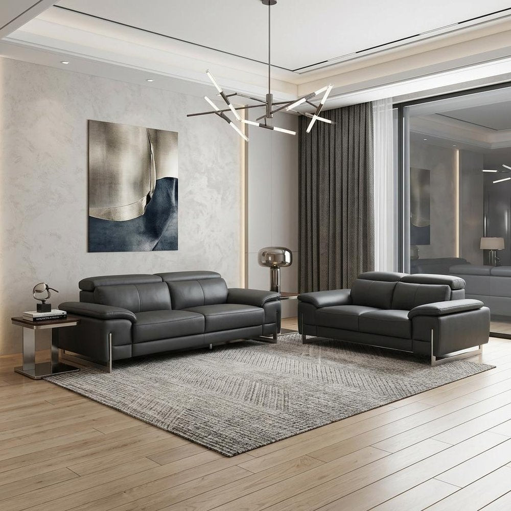 Two Piece Indoor Dark Gray Italian Leather Five Person Seating Set - 31" H x 71" W x 42" D in a home interior