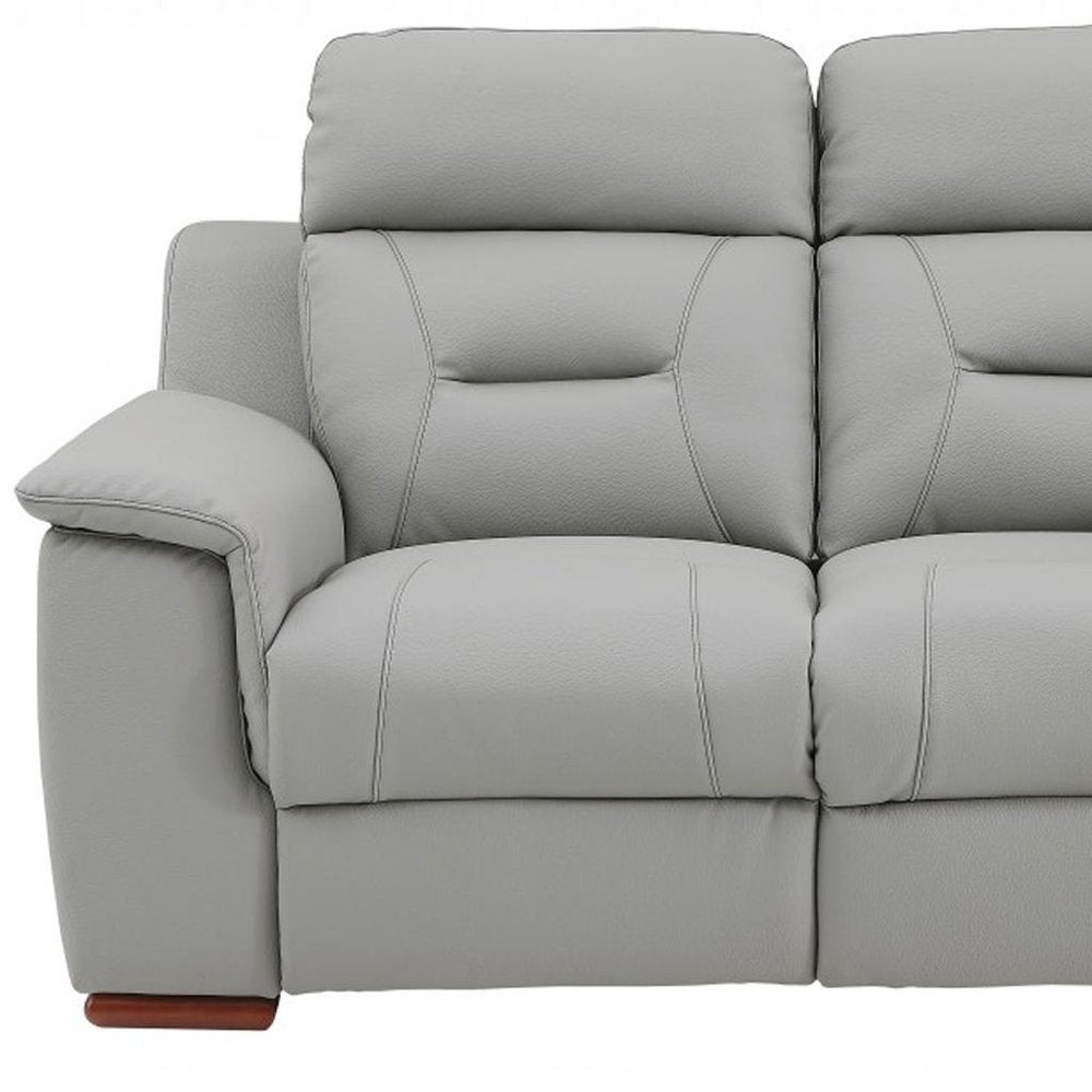 67" Gray And Brown Faux Leather Manual Reclining Loveseat