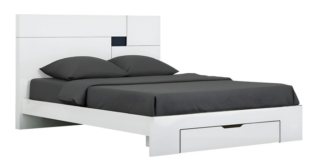 White CA king platform bed frame with storage drawer, dark gray bedding, against a white background.