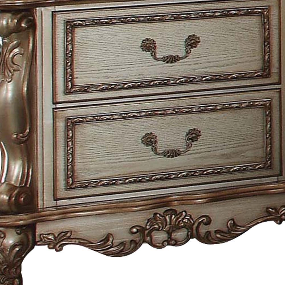 Close-up of 31" Gold Two Drawers Solid Wood Mirrored Nightstand showing gold wood detail.