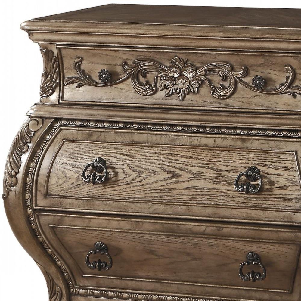 Cropped view of 34" Champagne Novelty Three Drawers Solid Wood Nightstand focusing on the dark brown wood surface.