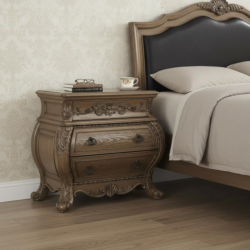 34" Champagne Novelty Three Drawers Solid Wood Nightstand styled in a furnished interior with an off-white wall on a wood floor in dark brown wood.