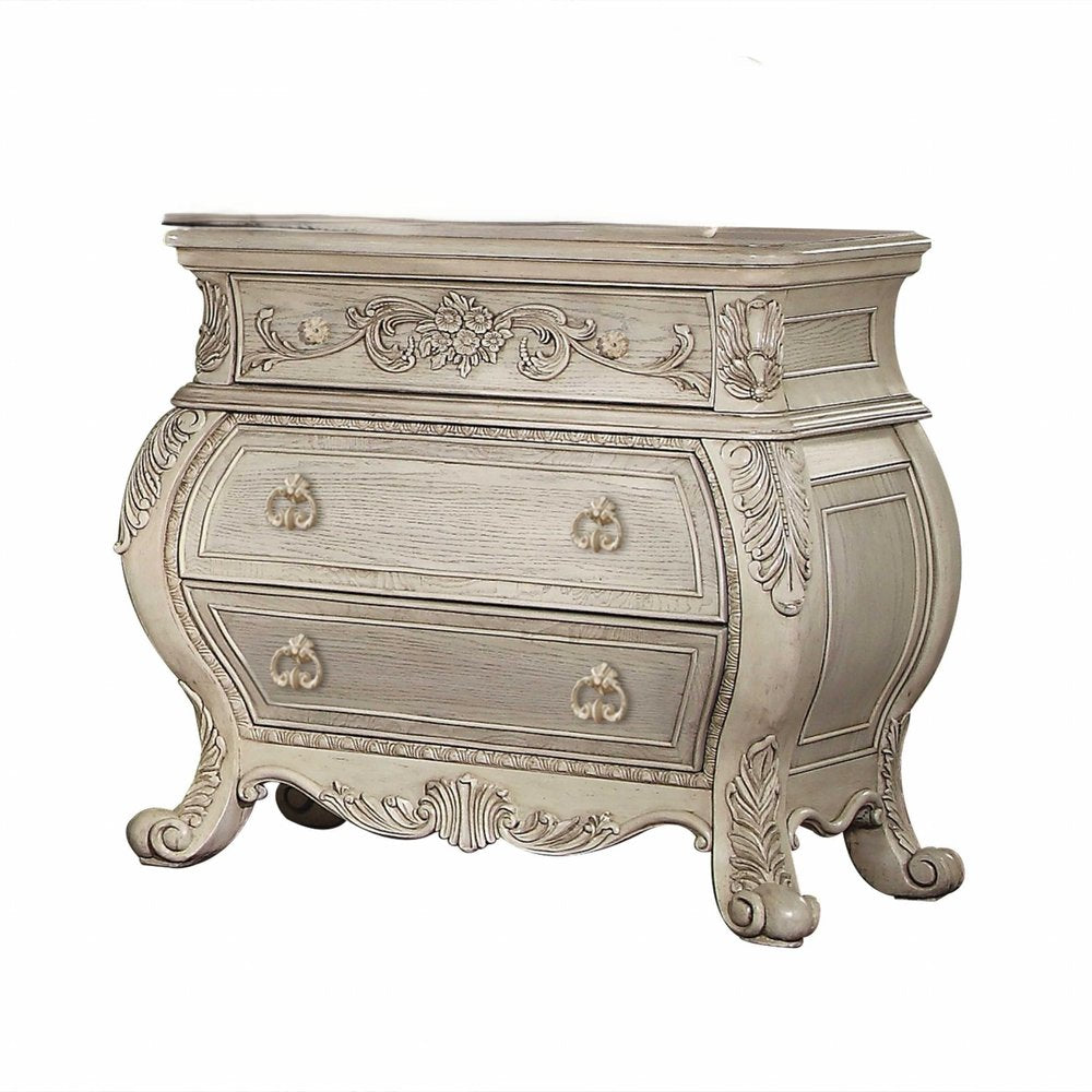 34" Antiqued White Solid Wood Three Drawer Nightstand. Nightstands & bedside table isolated on a plain white background, finished in white wood.