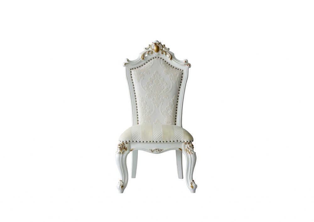 White and gold ornate dining chair with beige striped seat and damask back on a white background.