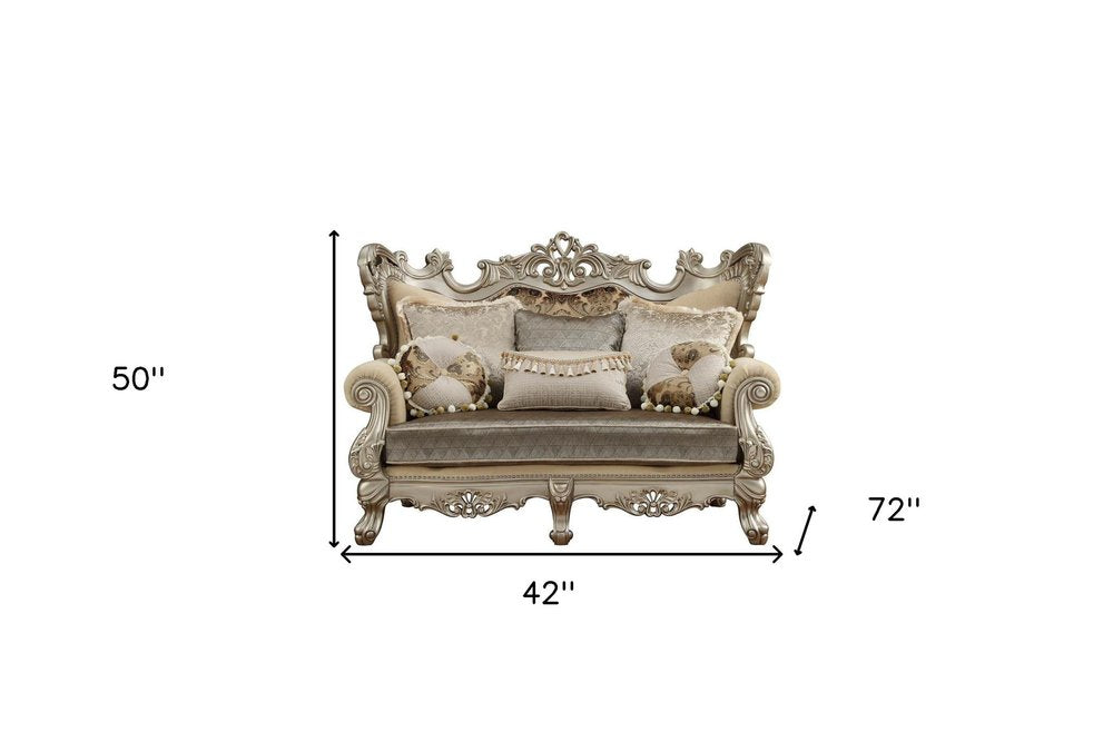 72" Cream And Platinum Damask Chesterfield Loveseat and Toss Pillows on a white background