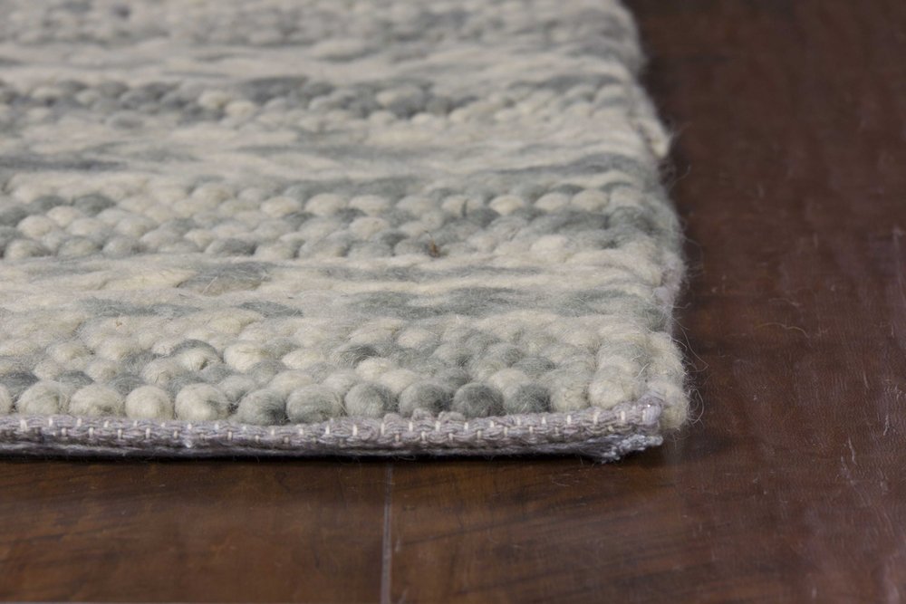 9' X 13' Wool Striped Hand Woven Area Rug in a home interior
