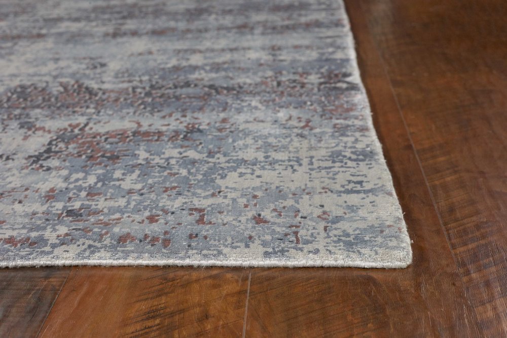 9' X 13' Slate Gray And Dark Gray Abstract Hand Loomed Area Rug in a home interior