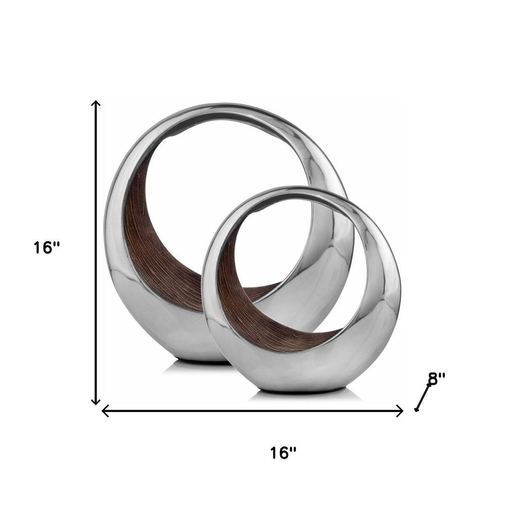 16" Silver and Brown Buffed Aluminum Tabletop Sculpture. Sculpture isolated on a plain white background, finished in silver metal.