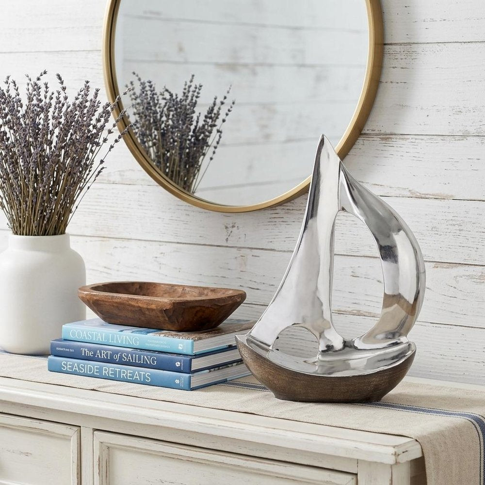 12" Brown and Silver Buffed Aluminum Sailboat Tabletop Sculpture. Sculpture in silver metal.