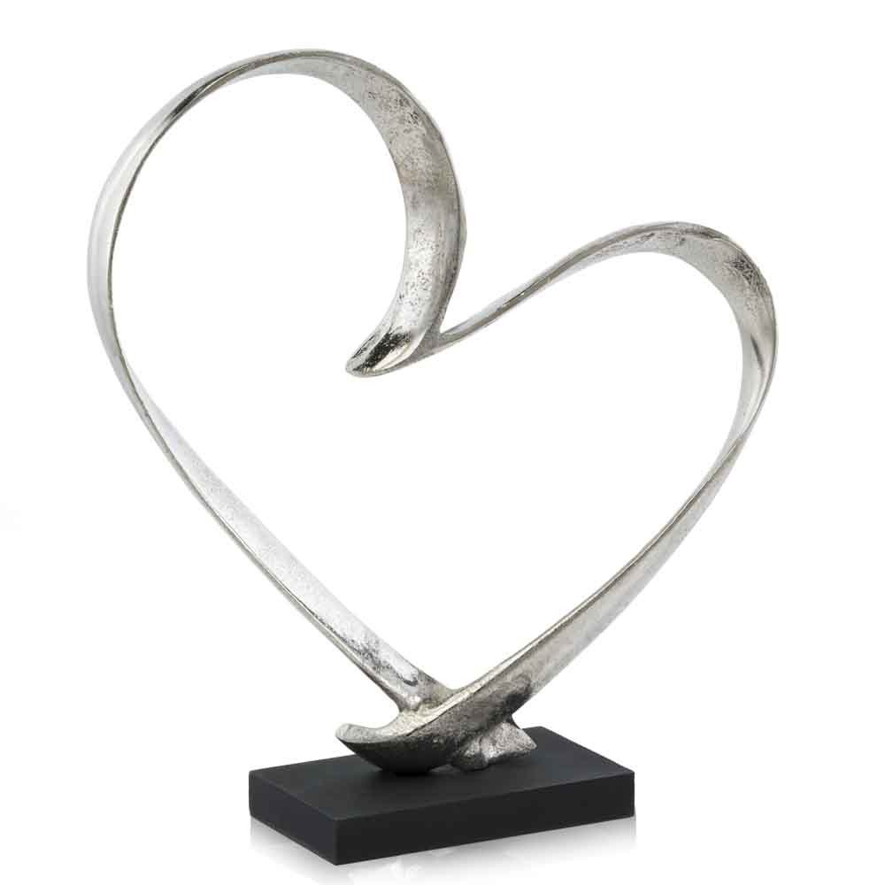16" Raw Silver And Black Heart Sculpture. Sculpture isolated on a plain white background, finished in silver.