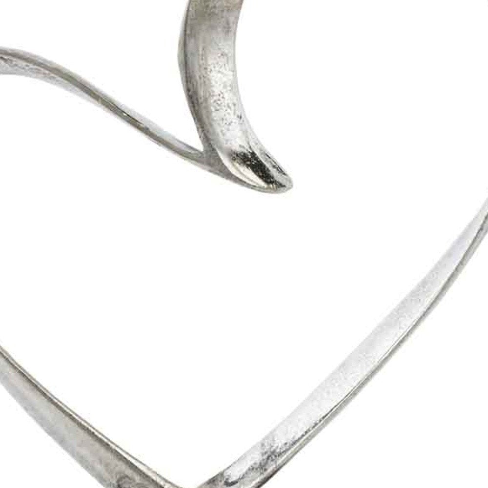 16" Raw Silver And Black Heart Sculpture. Sculpture isolated on a plain white background, showing its silver color.