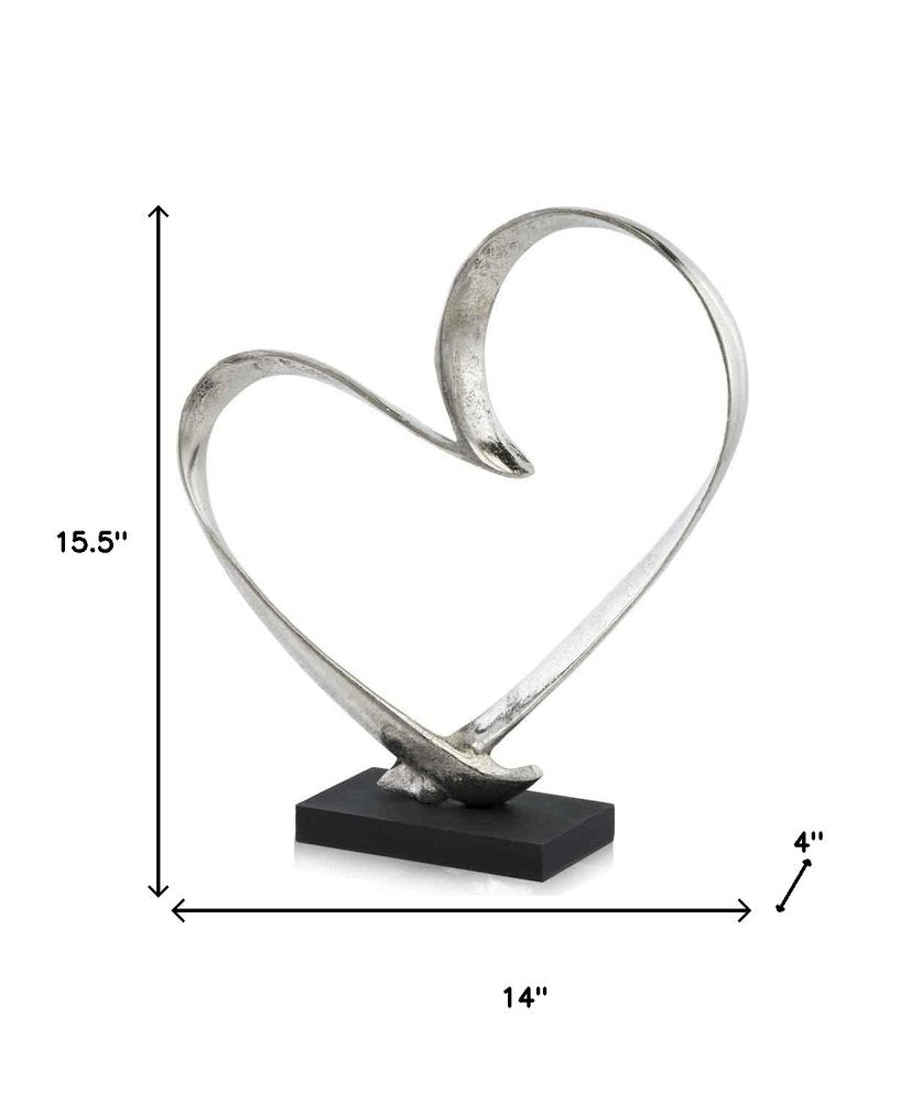 16" Raw Silver And Black Heart Sculpture. Sculpture isolated on a plain white background, showing its silver color.