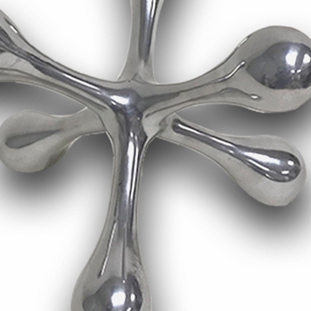 5" Silver Finish Decorative Jack. Sculpture isolated on a plain white background, finished in silver metal.