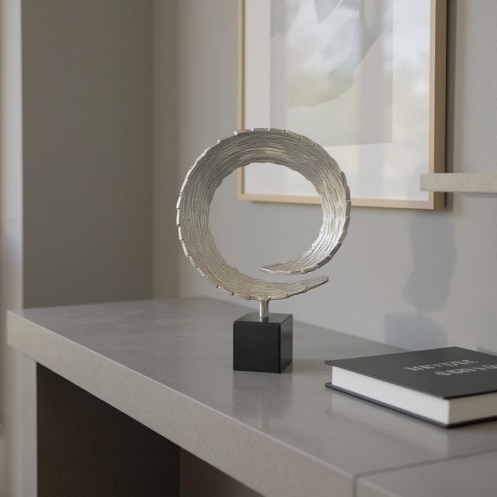 Detail view of 17" Black and Silver Marble and Aluminum Tabletop Sculpture, filling the frame with the silver metal texture.