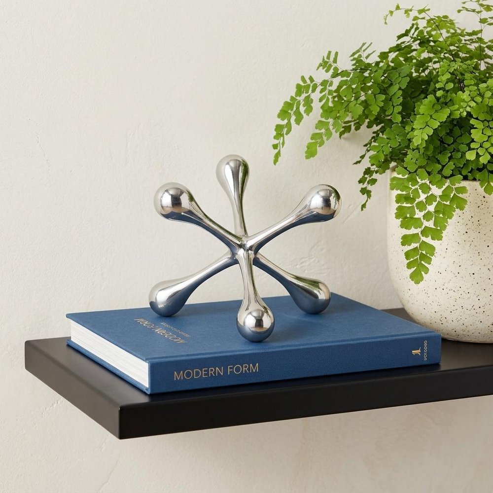 5" Silver Finish Decorative Jack shown outdoors on an outdoor setting with greenery.