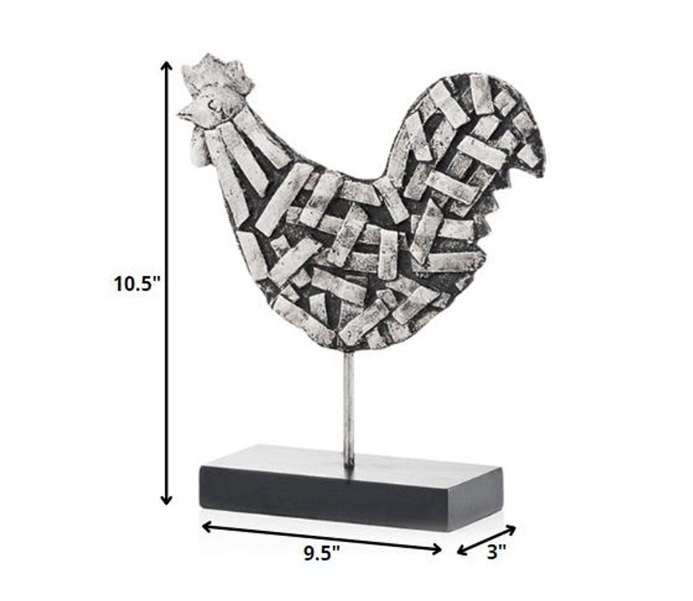 11" Black and Silver Aluminum Tabletop Sculpture. Sculpture isolated on a plain white background, showing a silver metal surface.