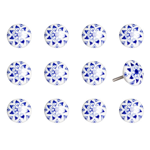 Twelve round ceramic drawer knobs with blue floral patterns on a white background.