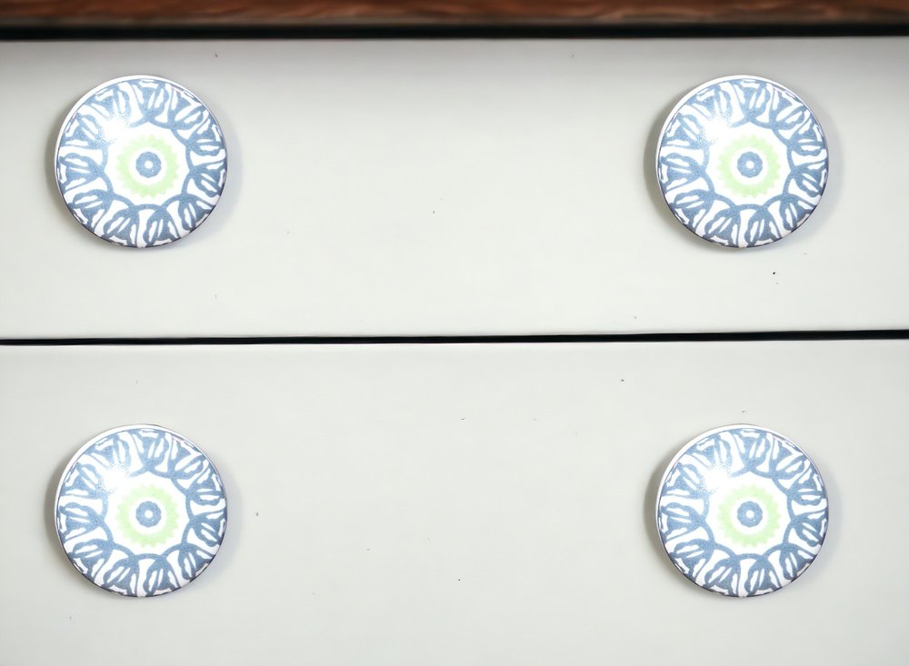 Set of Twelve White And Light Blue Metal And Ceramic Drawer Pull Knobs in a home interior