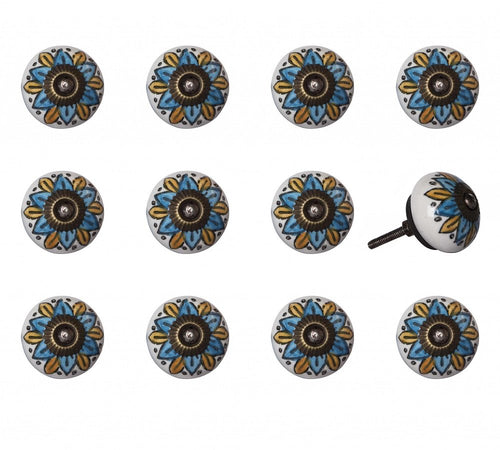 Twelve ceramic drawer knobs with a multicolor floral design and metal center, displayed on a white background.