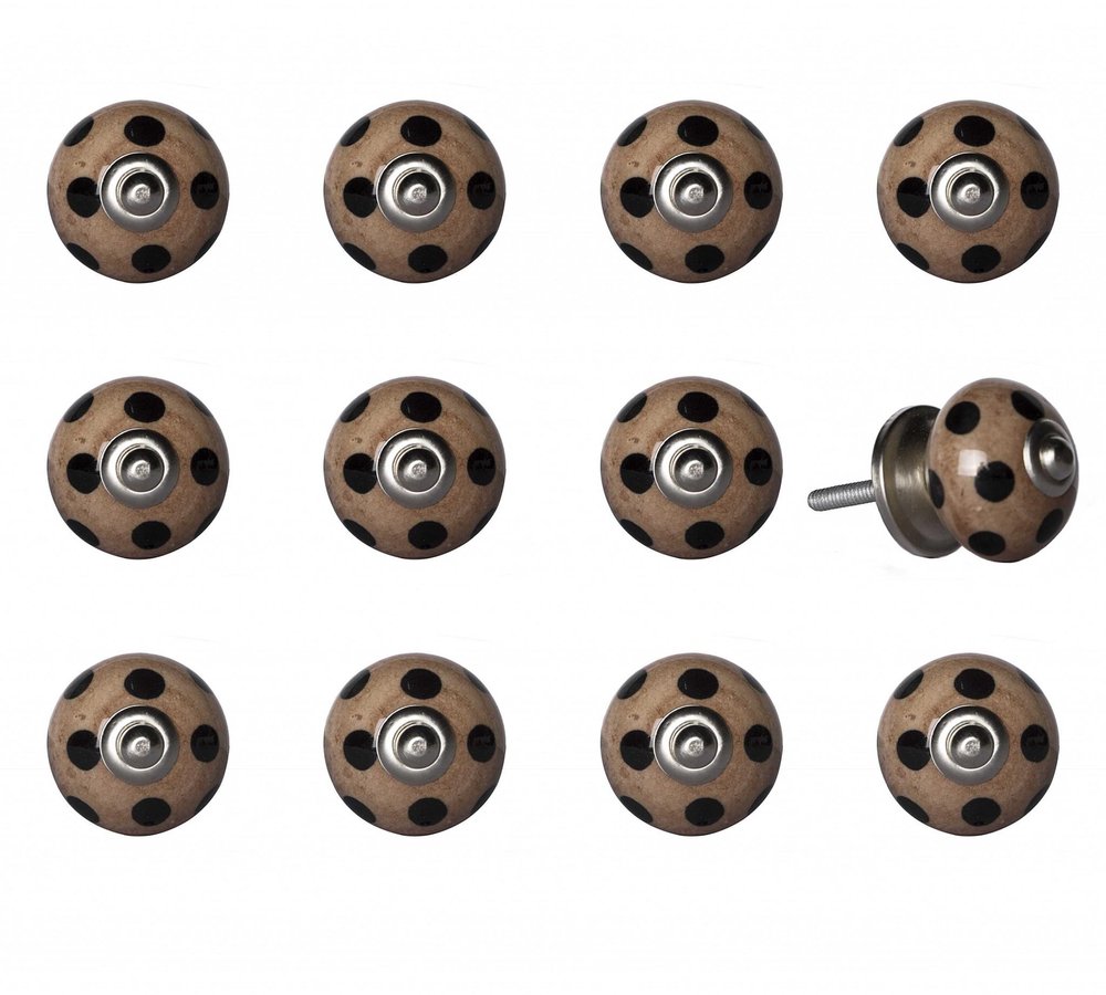 Set of twelve brown ceramic drawer knobs with black polka dots on a white background.