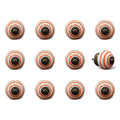 Set of Twelve Orange And White Geometric Ceramic Drawer Pull Knobs on a white background