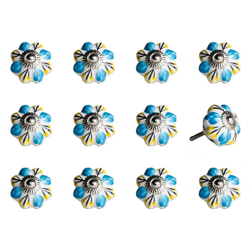 Twelve ceramic flower-shaped cabinet knobs in blue, yellow, and white with a metal screw on a white background.