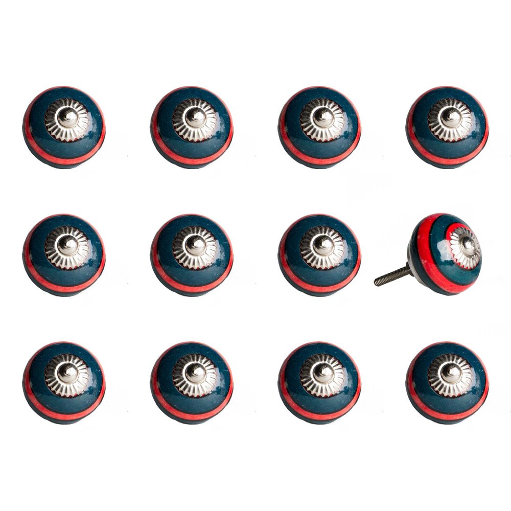 Twelve navy blue and red ceramic drawer knobs with silver accents on a white background.