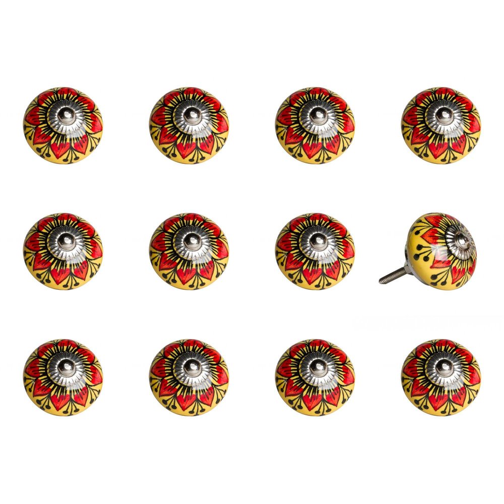 Twelve yellow and black floral ceramic drawer pull knobs with silver hardware on a white background.
