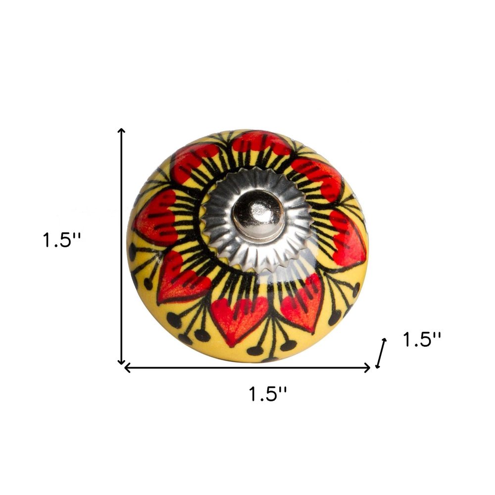 Set of Twelve Yellow And Black Floral Ceramic Drawer Pull Knobs on a white background