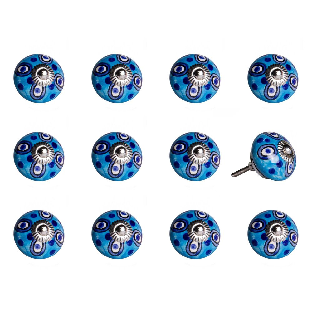 Twelve blue and white ceramic drawer knobs with a botanical design on a white background.