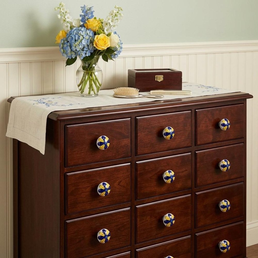 Set of Twelve Blue And Yellow Floral Ceramic Drawer Pull Knobs in a home interior