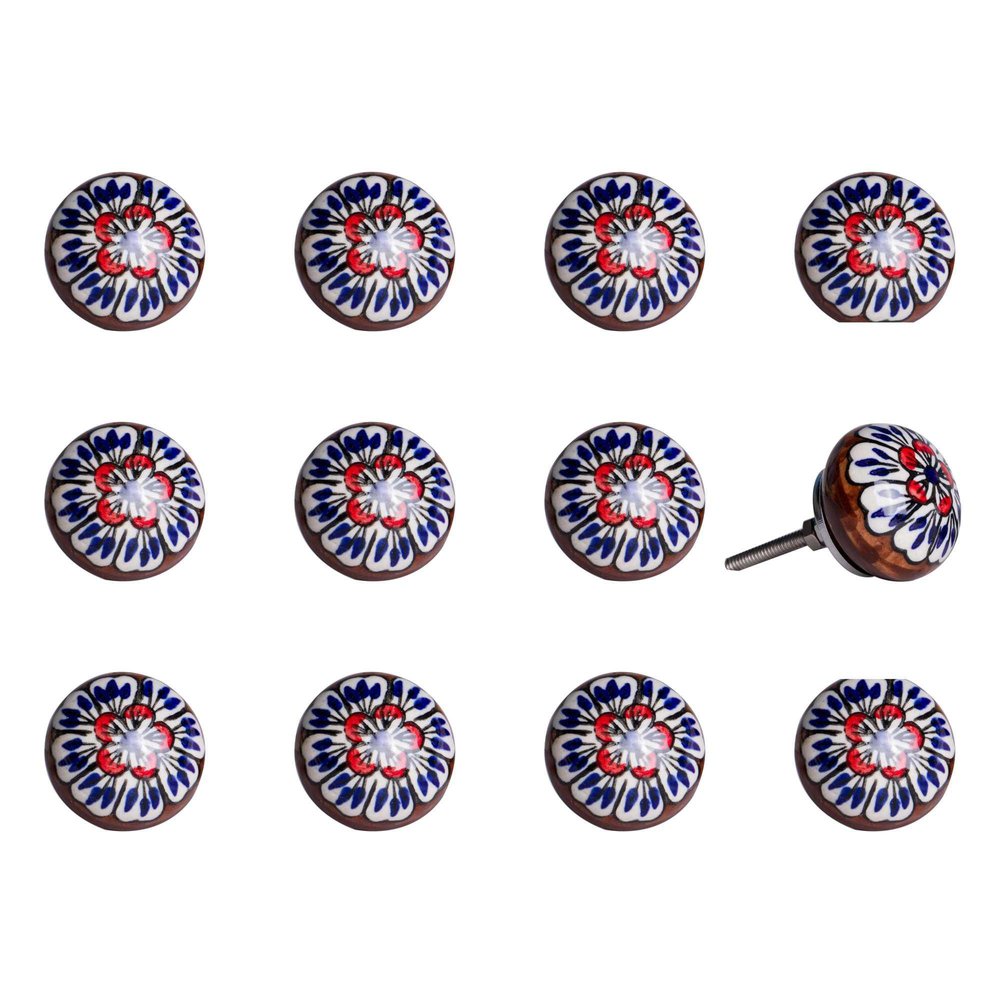 Twelve blue and white floral ceramic drawer knobs with a wooden base and metal screw on a white background.