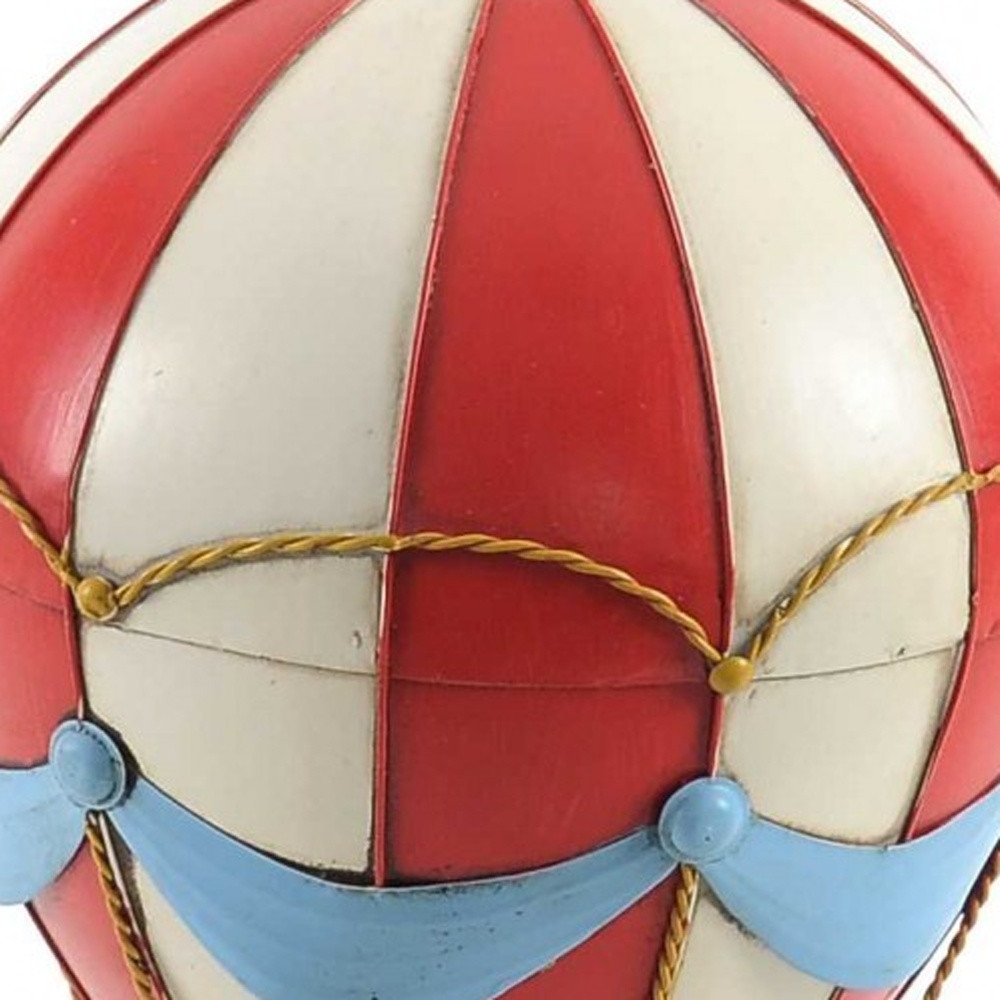 15" Red And White Metal Hand Painted Hot Air Balloon Tabletop Sculpture. Sculpture in white metal.