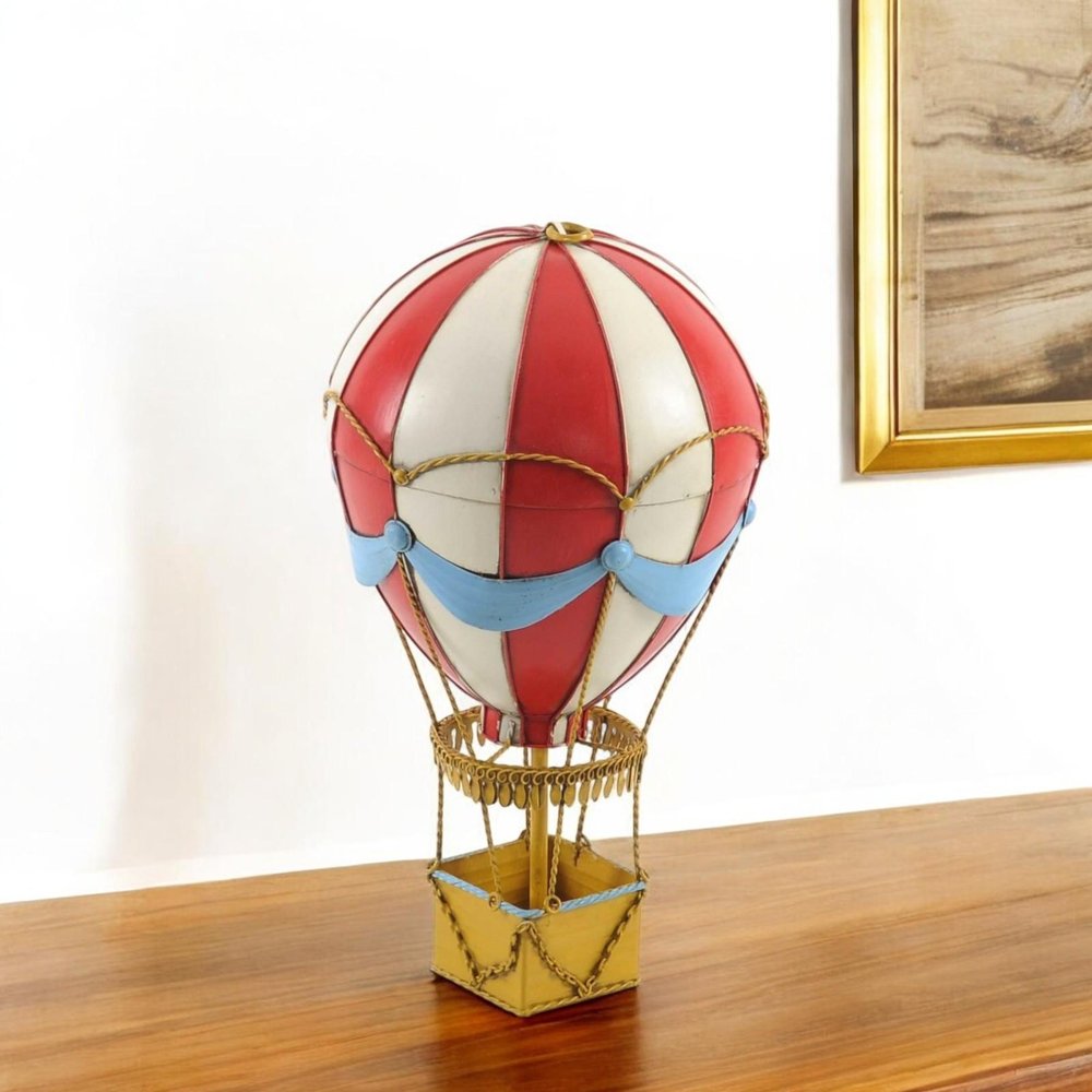 15" Red And White Metal Hand Painted Hot Air Balloon Tabletop Sculpture. Sculpture in white metal.