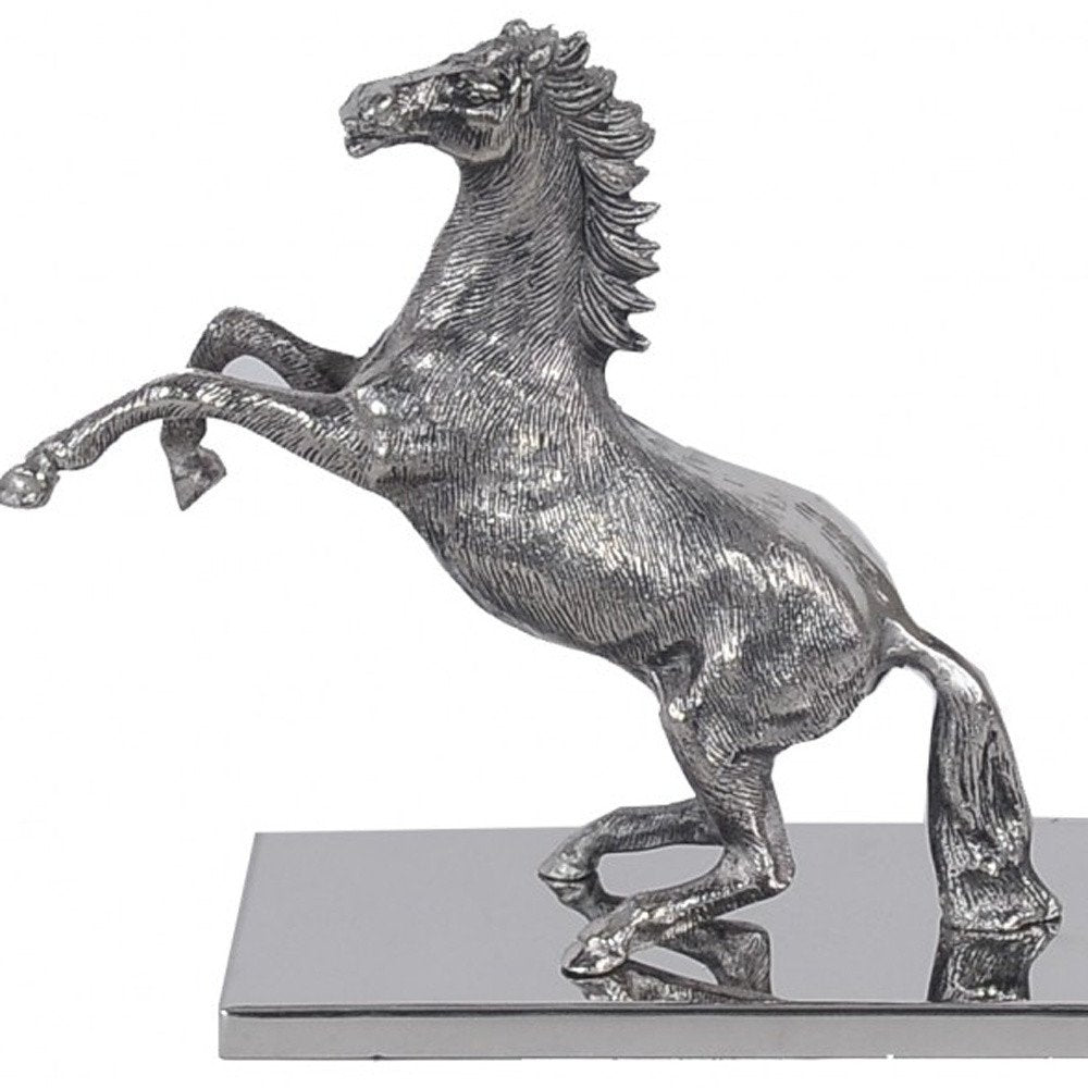 11" Nickel Metal Hand Painted Figurine Tabletop Sculpture. Sculpture isolated on a plain white background, showing a silver metal surface.