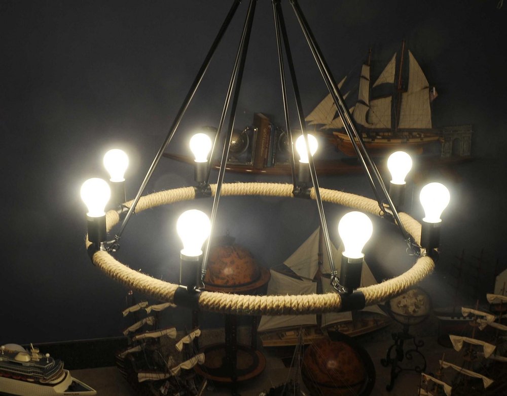 32" X 37" X 32" 8 Bulbs Rope Pendant Lamp photographed against a dark studio background in black.