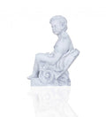 Vintage Look Off White Boy Sitting Statue on a white background