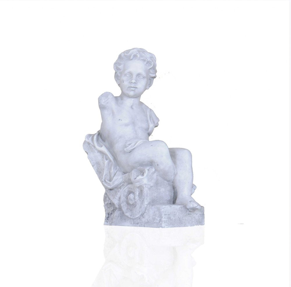 Vintage Look Off White Boy Sitting Statue on a white background