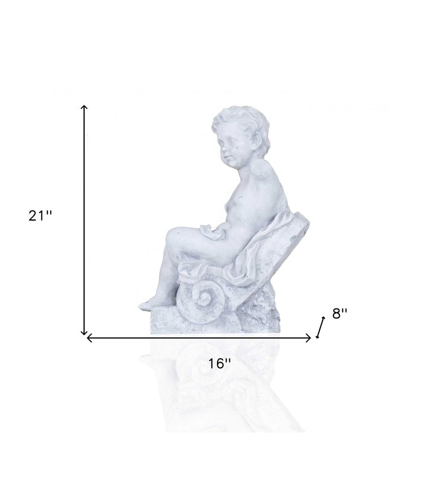 Vintage Look Off White Boy Sitting Statue on a white background