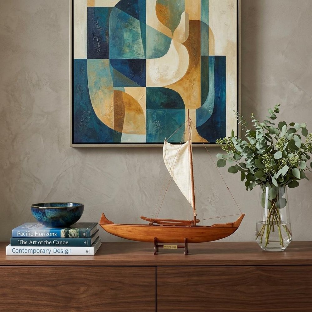 10" X 25.25" X 24" Hawaiian Canoe styled in a furnished interior with a tan wall on a dark wood floor in dark brown.