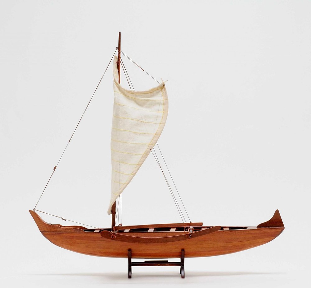 10" X 25.25" X 24" Hawaiian Canoe. Home product isolated on a plain white background, in a dark brown finish.